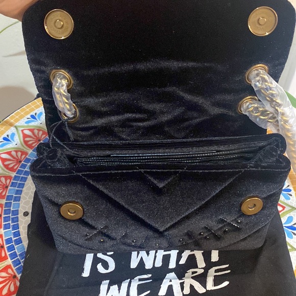 Mini Kensington Eye Quilted Velvet Crossbody Bag
Kurt Geiger London - Picture 8 of 12